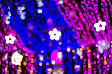 Abstract light yellow bokeh in night for merry christmas and happy new year.