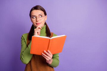 Sticker - Portrait of lovely brainy cheery minded girl reading book creating decision copy space isolated over pastel violet color background