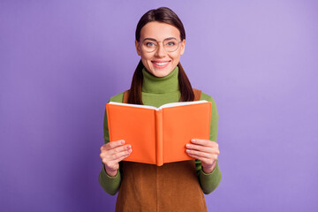 Sticker - Portrait of pretty brainy cheery glad girl reading book home task isolated over pastel violet color background