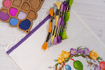 Set for beading. Beads in packages. Threads in the palette