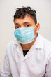 © themorningglory - Portrait of young asian man wearing face protective medical mask for protection from virus disease