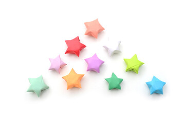 Wall Mural - Colorful origami lucky stars on white