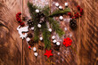 red viburnum. Christmas cones and branches on wooden boards with marshmallows