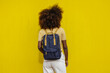© Victor Torres/ADDICTIVE STOCK - Back view black woman with afro hair with a backpack on her back