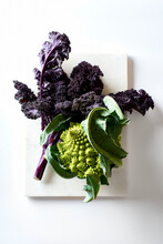 Red Kale And Romanesco Broccoli On White Background Top View