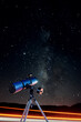 © Gabriel Trujillo/ADDICTIVE STOCK - Modern optical telescope against cloudless dark sky with glowing stars at night time