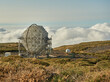 © Gabriel Trujillo/ADDICTIVE STOCK - Amazing view of modern telescopes on dark mountaintop against cloudy sky at astronomical observatory on island of La Palma in Spain