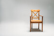 © Txema Gerardo/ADDICTIVE STOCK - Classical wooden chair isolated against gray background