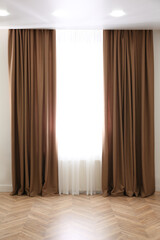 Wall Mural - Window with elegant curtains in modern room