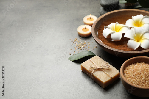 Spa composition with soap and spa items on grey table, space for text Fototapet