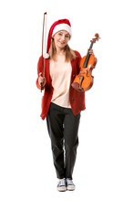 Mature Woman In Santa Hat And With Violin On White Background