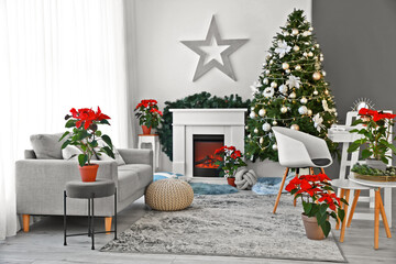 Interior of living room with fireplace decorated for Christmas