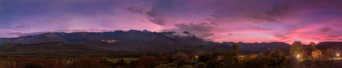 Wall Mural - Panoramic view of sunset over mountains in Corsica