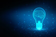 © meenkulathiamma - 2d illustration Brainstorm concept with futuristic glowing low polygonal light bulb and human brain