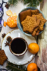 Wall Mural - cozy warming drink on christmas holiday coffee and cookies shape snowflake cozy home atmosphere hygge concept