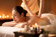© Blue Jean Images - Young woman receiving back massage at spa center