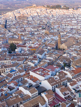 Vertical Aerial Image Of Antequera, A City In Andalusia With Many Churches And White Buildings 