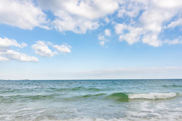 Sea waves and blue sky on sunny day background. copy space