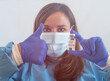 © fabio - Covid19, coronavirus, healthcare and doctors concept. Portrait of optimistic caucasian female doctor assure everything be okay, thumb-up, wear medical mask to prevent catching virus.