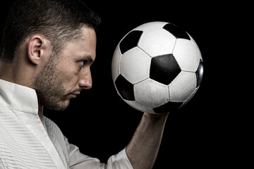 Man Holding Soccer Ball