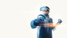 Woman Doctor In A Helmet Of Viotual Reality With Manipulators In Hands On A White Background. The Concept Of Conducting Remote Operations Using Modern VR Technologies