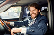 © SHOTPRIME STUDIO - rich man in suit driving car trip road success lifestyle
