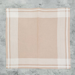 Wall Mural - Beige Handkerchief for men on grey background.