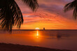 © jdross75 - Tahiti sunset with sailboat and palm trees
