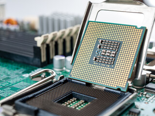 the process of connecting the CPU to the processor socket on a modern computer motherboard, replacing the silicon data processing chip, and correctly installing the central processing unit