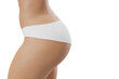 © PixlMakr - Slim tanned woman's body