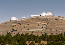 White Round Radar Domes On A Hill On The AI-Petri Plateau In The Mountains Of Crimea