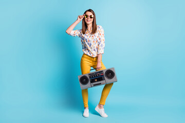 Wall Mural - Full length body size photo of funky girl keeping retro boom-box recorder wearing bright outfit isolated on vibrant blue color background