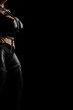 © PixlMakr - Mistress in shiny black latex costume and leather straps