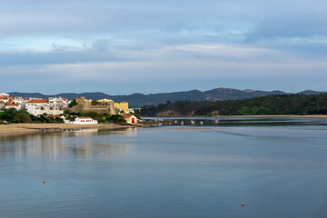 Wall Mural - view of the castle and village of Milfontes andthe Mira River