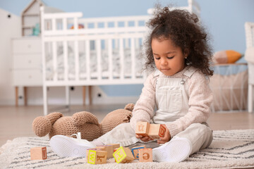 Poster - Cute African-American baby girl playing at home