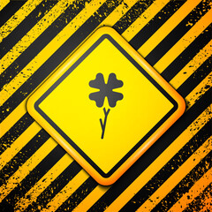 Poster - Black Four leaf clover icon isolated on yellow background. Happy Saint Patrick day. Warning sign. Vector.