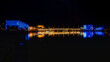 Panorama Weitwinkelaufnahme einer beleuchteten Stadt in den Nachtstunden Linz City Lentos Kunstmuseum Nibelungenbrücke Schlossmuseum Ars Electronica Center Donau