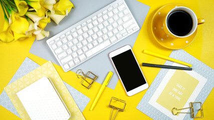 Wall Mural - 2021 colors of the year, yellow and gray, desktop workspace with keyboard, smart phone and desk accessories. Top view blog hero header creative composition flat lay.