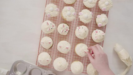 Sticker - Flat lay. Step by step. Decorating vanilla cupcakes with white buttercream frosting for Easter.