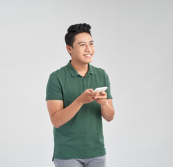 Wall Mural - Happy smile face of handsome Asian man use smartphone.