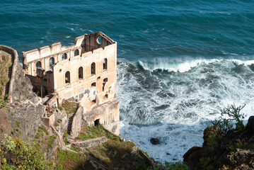 Wall Mural - Abandoned building next to sea