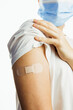 © phpetrunina14 - making injection of vaccine in shoulder white background