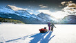 Two children drag a sled full of ice fishing gear across frozen ice and snow on the Spray Lakes in Peter Lougheed Provincial Park in the Canadian Rockies.