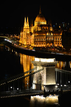 Hungary, The Night City Of Budapest, Parliament And Part Of The Chain Bridge On The Background Of The Night City