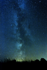 Wall Mural - vertical photo of clear night sky with milky way and huge amount of stars.