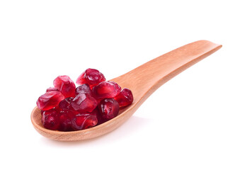 Wall Mural - Fruit pomegranate in wood spoon on white background