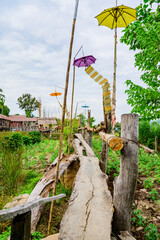 Canvas Print - Small Wood Bridge in Park at Pua District