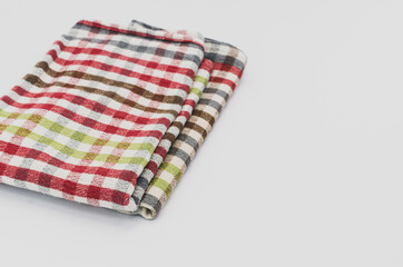 A closeup shot of checkered table napkins isolated on white background