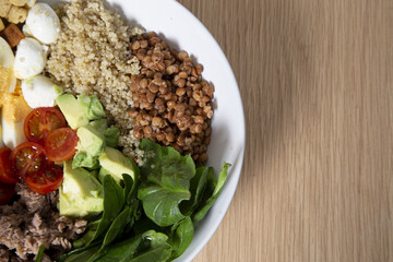 Poster - A closeup shot of a salad bowl with various healthy ingredients with copy space. Healthy life concept