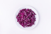 Sliced Red Cabbage In A Bowl Isolated On A White Background